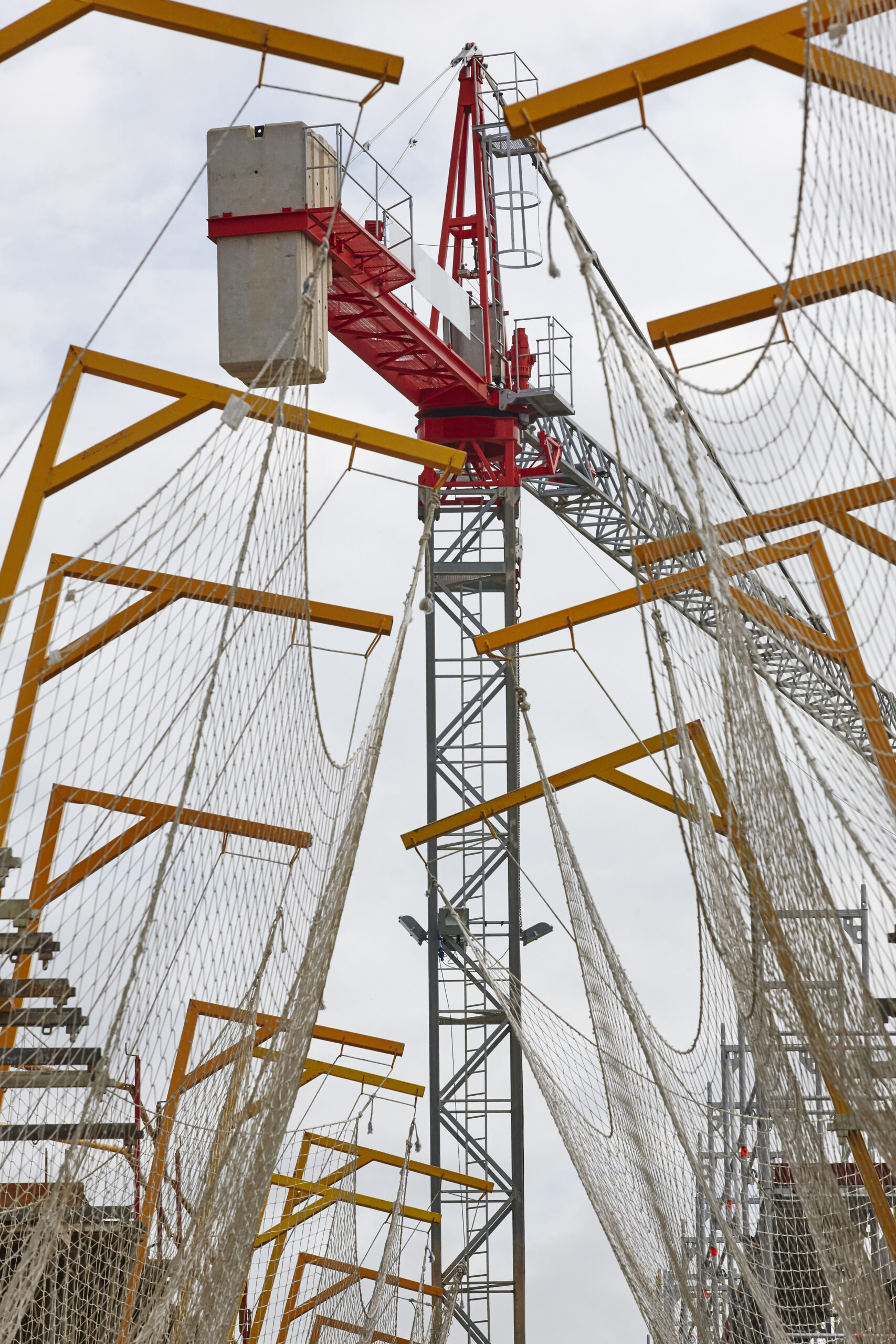 Building under construction. Crane machinery structure. Industry